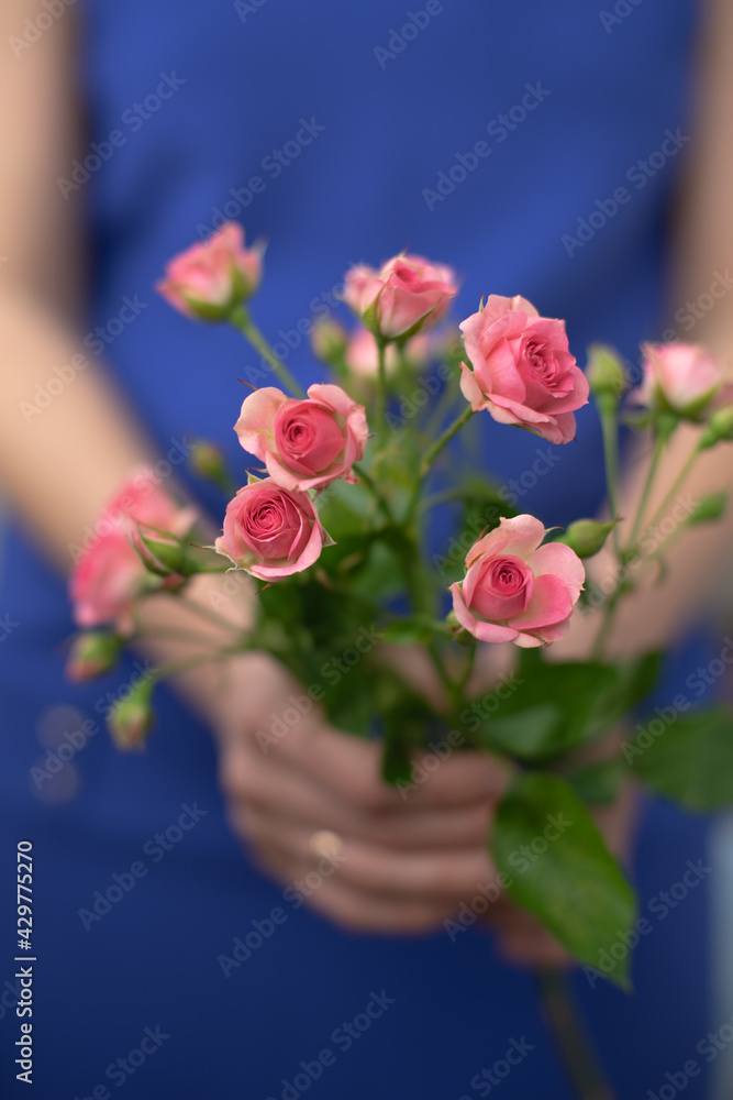 hands with roses