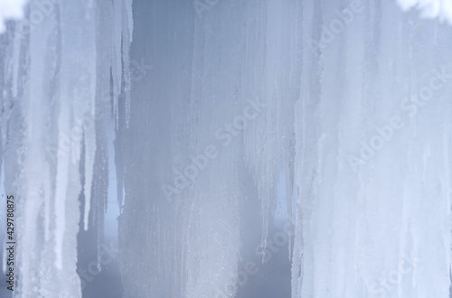 Ice caves. Formation of large icicles. Ice stalactites  © Ivan