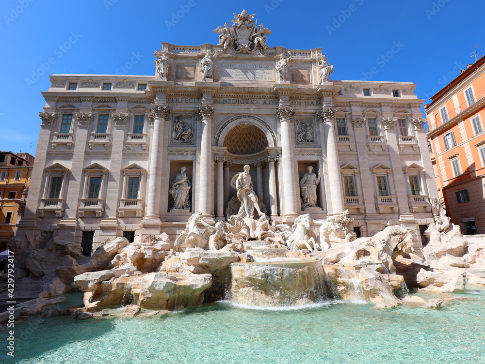 monument called the Trevi Fountain in central Rome with the statue of Neptune without tourists because of the coronavirus in Italy