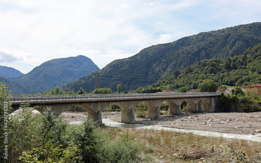 bridge over the river in Northern Italy to reach the country on the other side