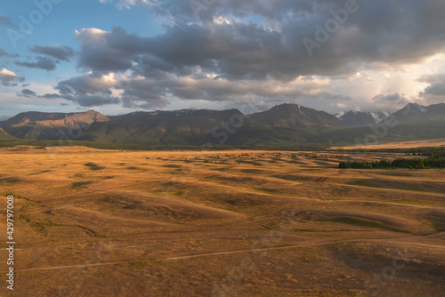 mountains steppe forest clouds sunset