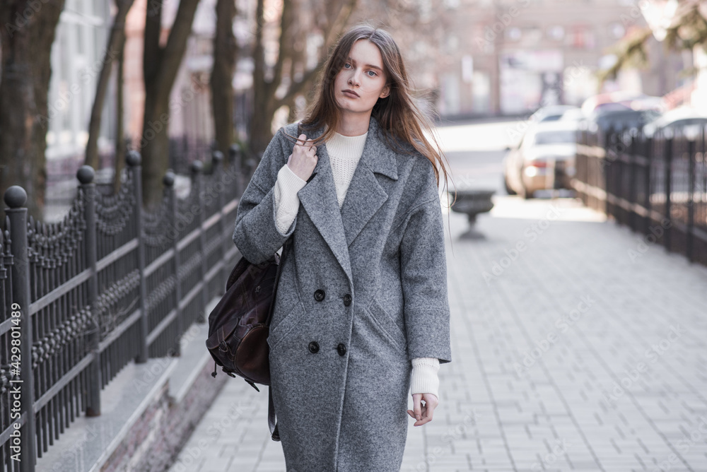 Portrait of an attractive girl on the street while walking Portrait of an attractive girl on the street while walking