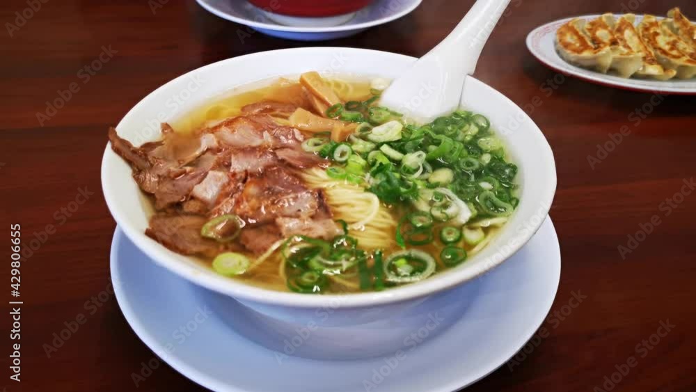 Fresh steaming Ramen noodle soup and Gyoza in Kyoto, Japan Fresh steaming Ramen noodle soup and Gyoza in Kyoto, Japan