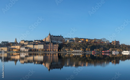 View over old houses in the Södermalm district a spring day at sunrise in Stockholm from the Riddarholmen island 