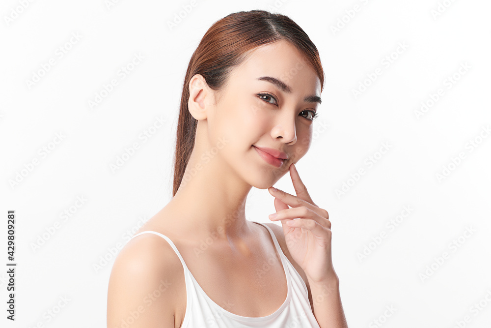 Beautiful young asian woman with clean fresh skin on white background, Face care, Facial treatment, Cosmetology, beauty and spa, Asian women portrait Beautiful young asian woman with clean fresh skin on white background, Face care, Facial treatment, Cosmetology, beauty and spa, Asian women portrait