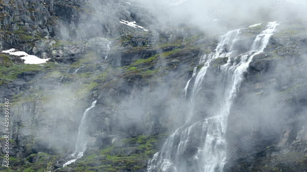 Beautiful nature of Norway. A mountain waterfall from a glacier high in the mountains of Norway. Beautiful nature of Norway. A mountain waterfall from a glacier high in the mountains of Norway.