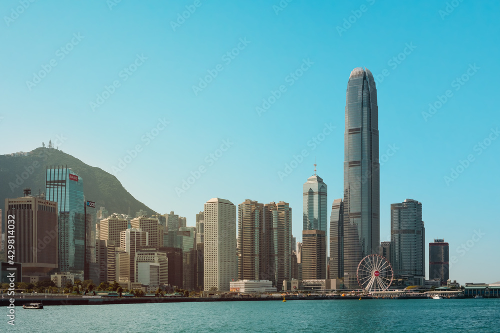 Naklejka premium Coast and Skyline of Hong kong Island business district and Victoria Harbour