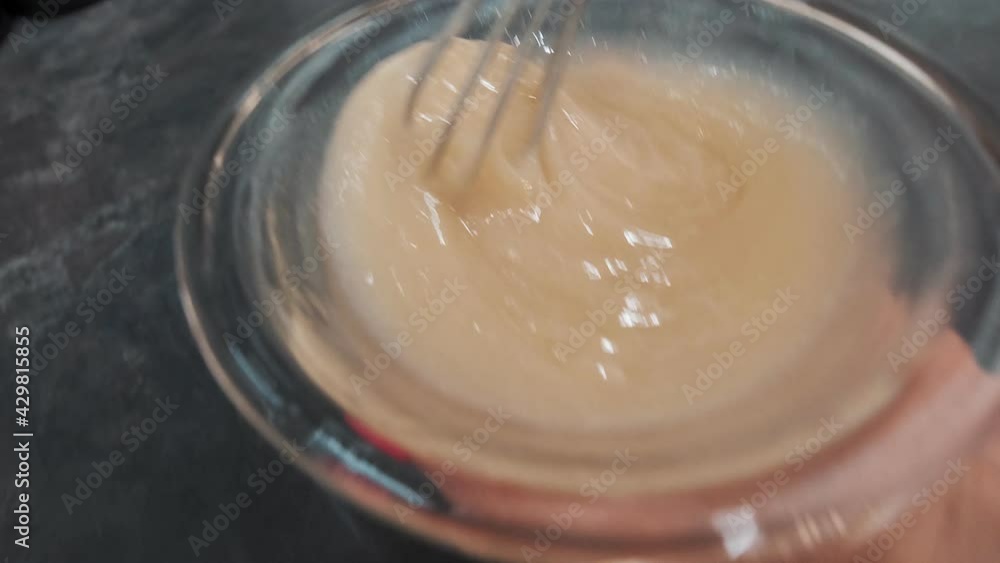 Hairdresser mixes hair dye in the beauty salon Hairdresser mixes hair dye in the beauty salon