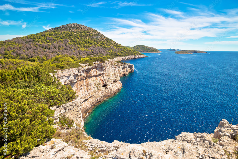 Kornati archipelago national park. Spectacular cliffs of Telascica bay above blue Adriatic sea