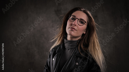Posing for a photo shoot - young woman in her mid - 20s - studio photography