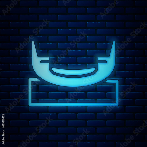 Glowing neon Boat swing icon isolated on brick wall background. Childrens entertainment playground. Attraction riding ship, swinging boat. Amusement park. Vector