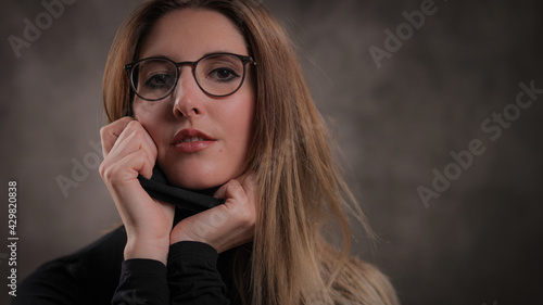 Young pretty woman in her mid 20s - portrait shot - studio photography