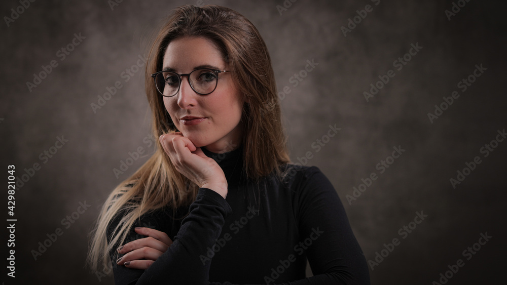 Young pretty woman in her mid 20s - portrait shot - studio photography Young pretty woman in her mid 20s - portrait shot - studio photography
