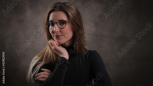 Young pretty woman in her mid 20s - portrait shot - studio photography