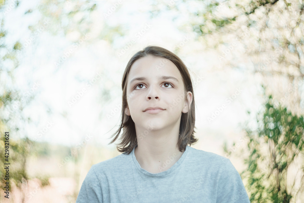 portrait of a boy standing outdoor