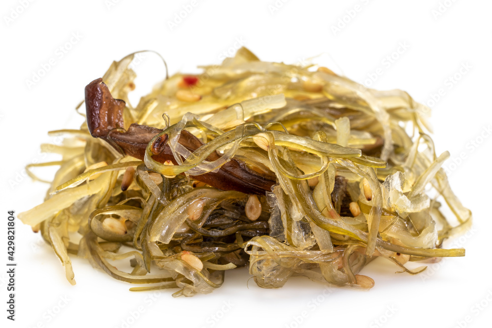 seaweed salad with sesame seeds, a heap on white background