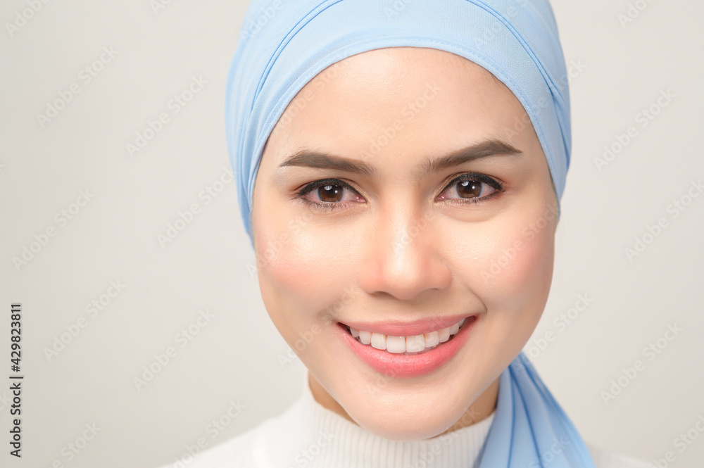 close up of young beautiful muslim woman with hijab isolated on white background studio, muslim beauty skin care concept. close up of young beautiful muslim woman with hijab isolated on white background studio, muslim beauty skin care concept.