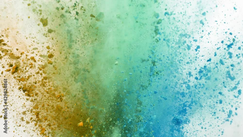 Super slow motion of colored powder explosion isolated on white background. Filmed on high speed cinema camera, 1000fps. Super slow motion of colored powder explosion isolated on white background. Filmed on high speed cinema camera, 1000fps.