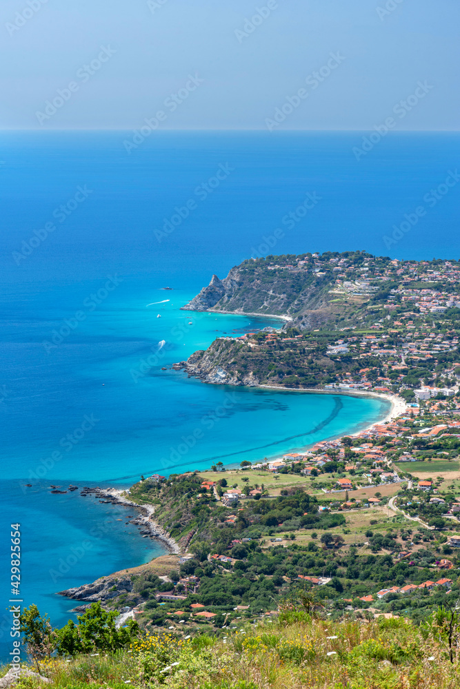 Vibo Valenzia district, Calabria, Italy, Europe, view from Mount Poro of the south coast of Capo Vaticano with the small bays of Coccorino in the foreground, in the background the beach of Santa Maria