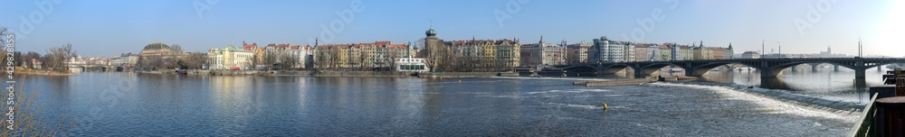 Panoramic view along Vltava river towards Smetanovo, embankment, Prague, Czech.