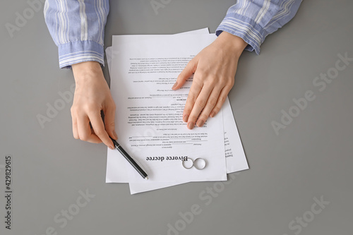 Woman with divorce decree a...