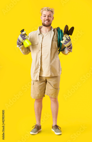 Young male gardener on colo...