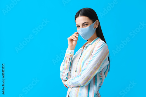 Stylish young woman wearing...