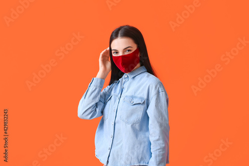 Stylish young woman wearing...