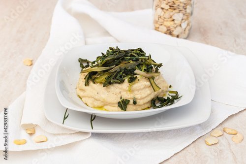 The traditional recipe from Puglia: chicory with fave beans puree. Vegan recipe