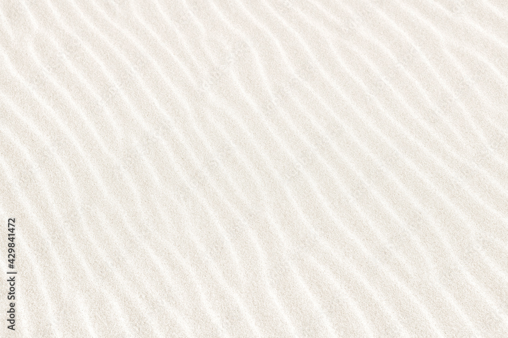 Abstract irregular pattern in white sand on beach. Textured summer background. Abstract irregular pattern in white sand on beach. Textured summer background.