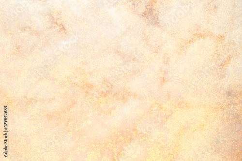 abstract hazy background peach color puffs of smoke or clouds