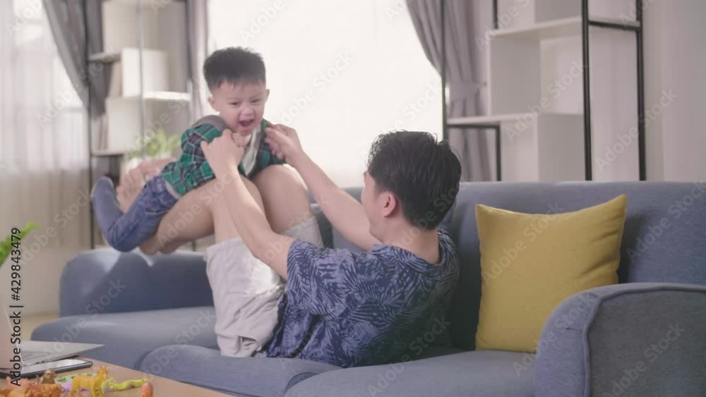 Young Asian Man Father Playing With His Son At Home
Young Asian Man Father Playing With His Son At Home