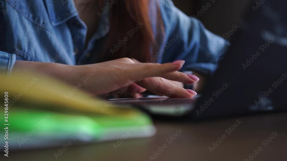 Business woman working office laptop, communicating clients company, conducting business correspondence, remote employee fulfills order writing text, notebook, a notebook for notes, ideas lies nearby Business woman working office laptop, communicating clients company, conducting business correspondence, remote employee fulfills order writing text, notebook, a notebook for notes, ideas lies nearby
