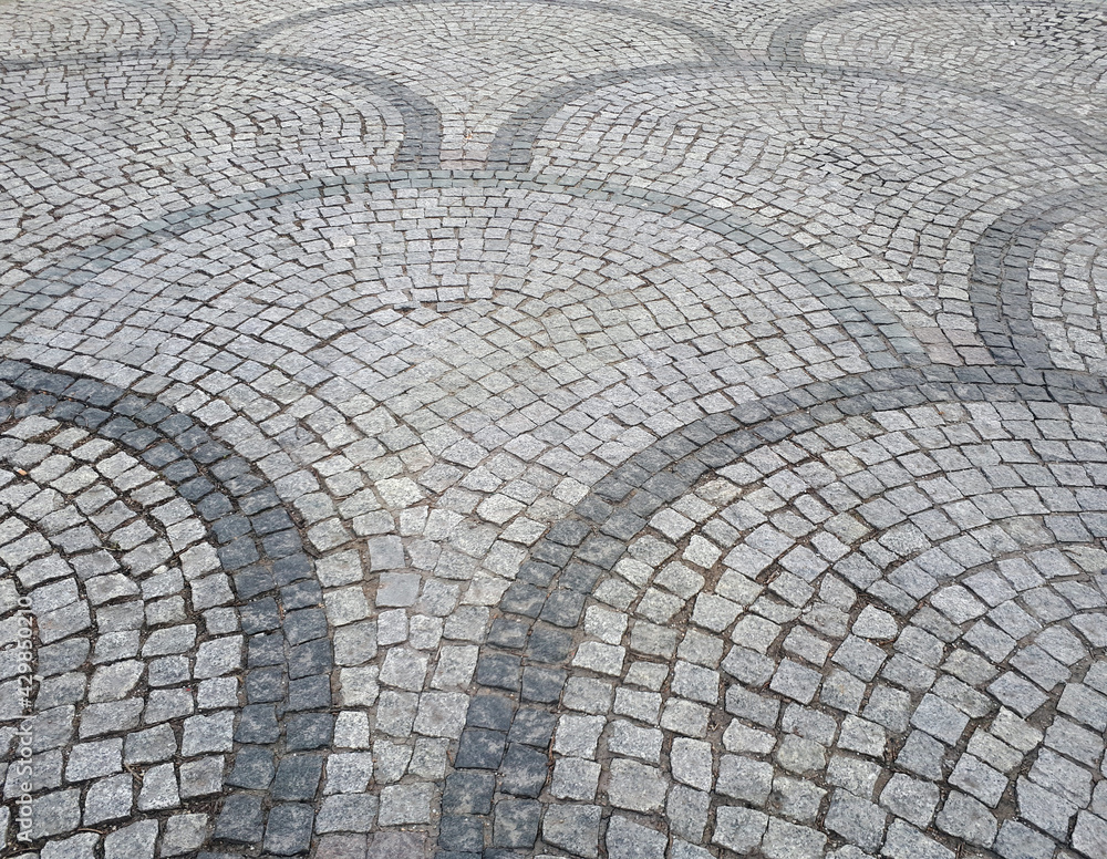 Decorative sidewalk folded from granite cobblestone Decorative sidewalk folded from granite cobblestone