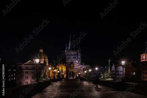 Charles Bridge in Prague is a famous Czech monument, night photo without people