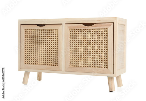 New wooden commode on white background. Interior element photo