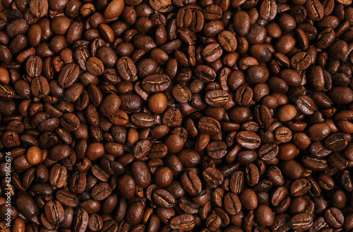 Coffee beans background close up.