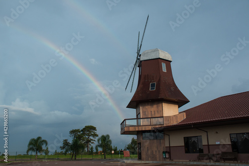 Arco-íris no final da tarde na beira da estrada em Carambeí no Paraná, Brasil, moinho, restaurante Niemeyer photo