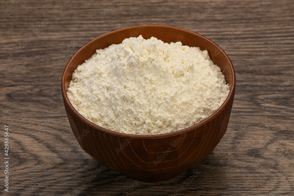 Wheat flour heap in the bowl Wheat flour heap in the bowl