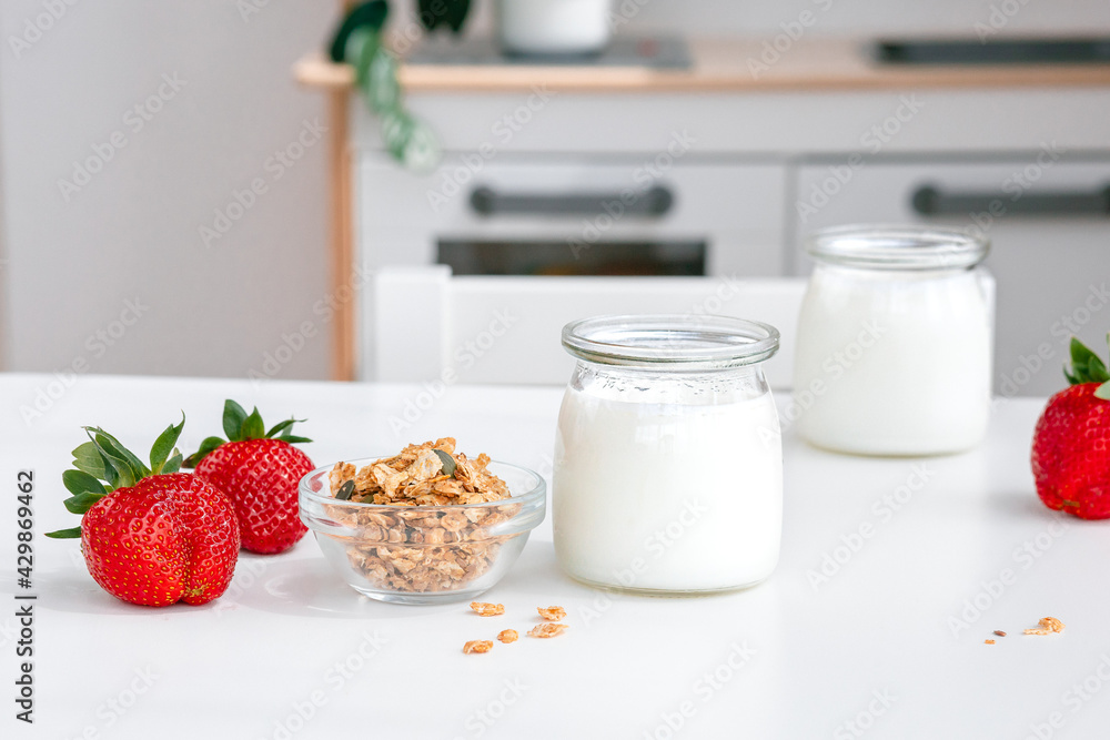 Greek yogurt with fresh strawberries and oatmeal for breakfast for children Greek yogurt with fresh strawberries and oatmeal for breakfast for children