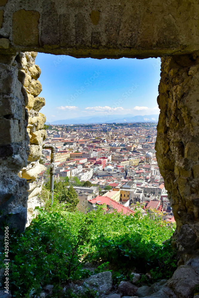 Panorama of the historic city center of Naples from a ruined wall, Italy.