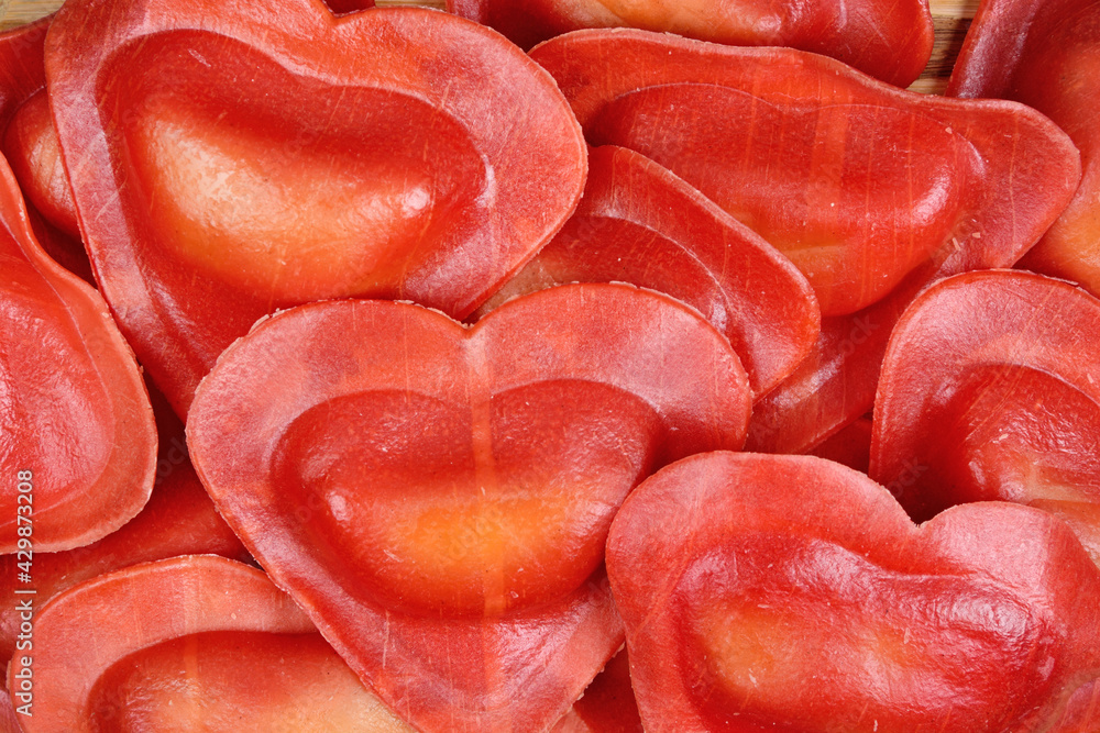 Red heart ravioli with cherry tomato and mozzarella Red heart ravioli with cherry tomato and mozzarella