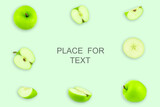 Creative layout with green apples on a light background. Food concept. Copy spaсe