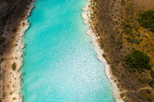 Bacalar lagoon with crystal blue water. Los Rapidos, Mexico. © Simon