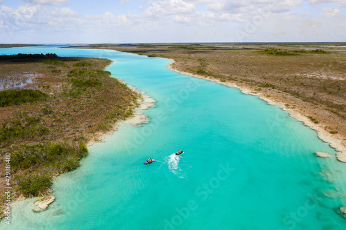 Kayaking along Los rapidos de Bacalar cenote in Mexico photo