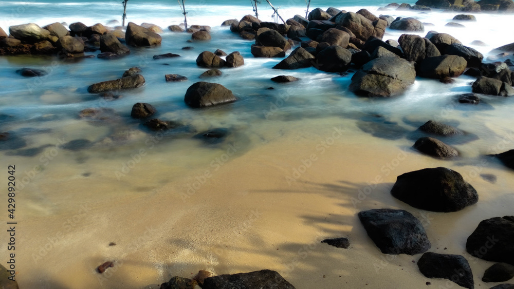beach and rocks beach and rocks