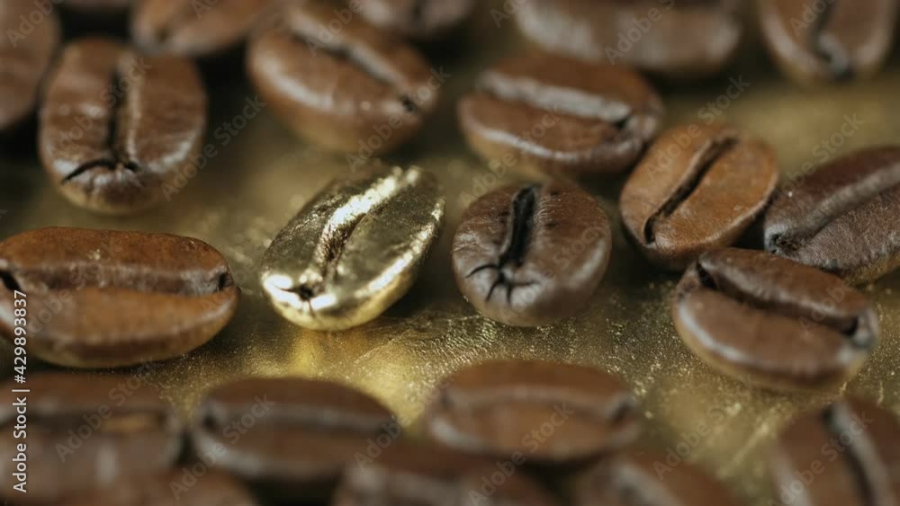 Gold grain. Roasted vietnamese coffee bean. Fragrant coffee beans scrolls slowly around the camera. Slow Motion Close Up of Whole Roasted Coffee Beans.High angle view. 4k Gold grain. Roasted vietnamese coffee bean. Fragrant coffee beans scrolls slowly around the camera. Slow Motion Close Up of Whole Roasted Coffee Beans.High angle view. 4k