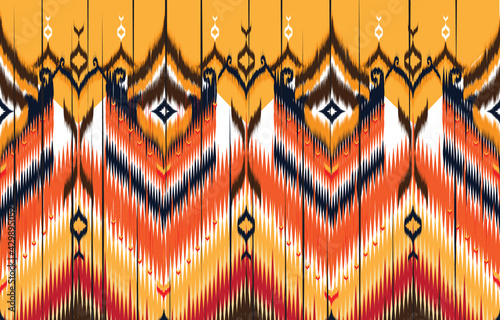 
Tribal vector ornament. Seamless African pattern. Ethnic carpet with chevrons. 
Aztec style. Geometric mosaic on the tile, majolica. Ancient interior. 
Modern rug. Geo print on textile. Kente Cloth.