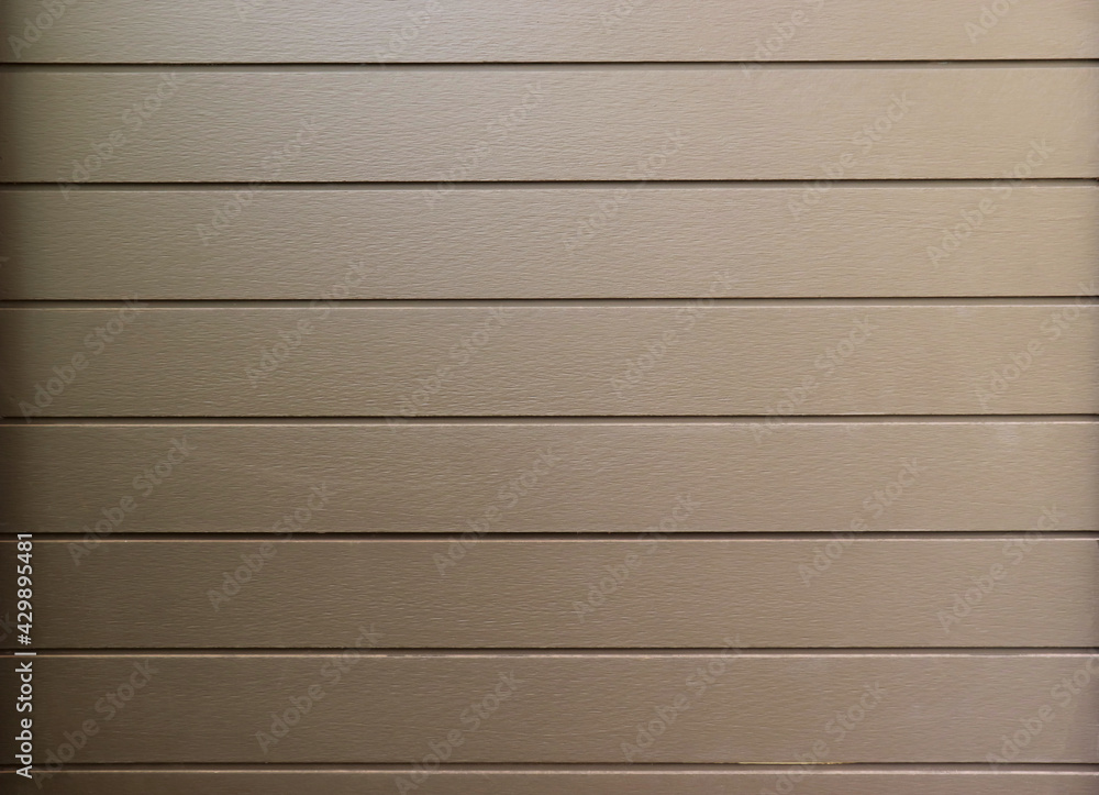 Wood grain background And the sunlight creates shadows on the walls. Wood grain background And the sunlight creates shadows on the walls.