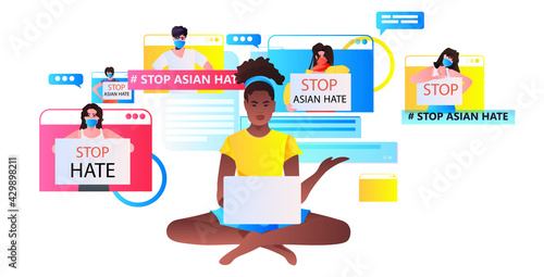 stop asian hate activists in masks protesting against racism in web browser windows support people during coronavirus